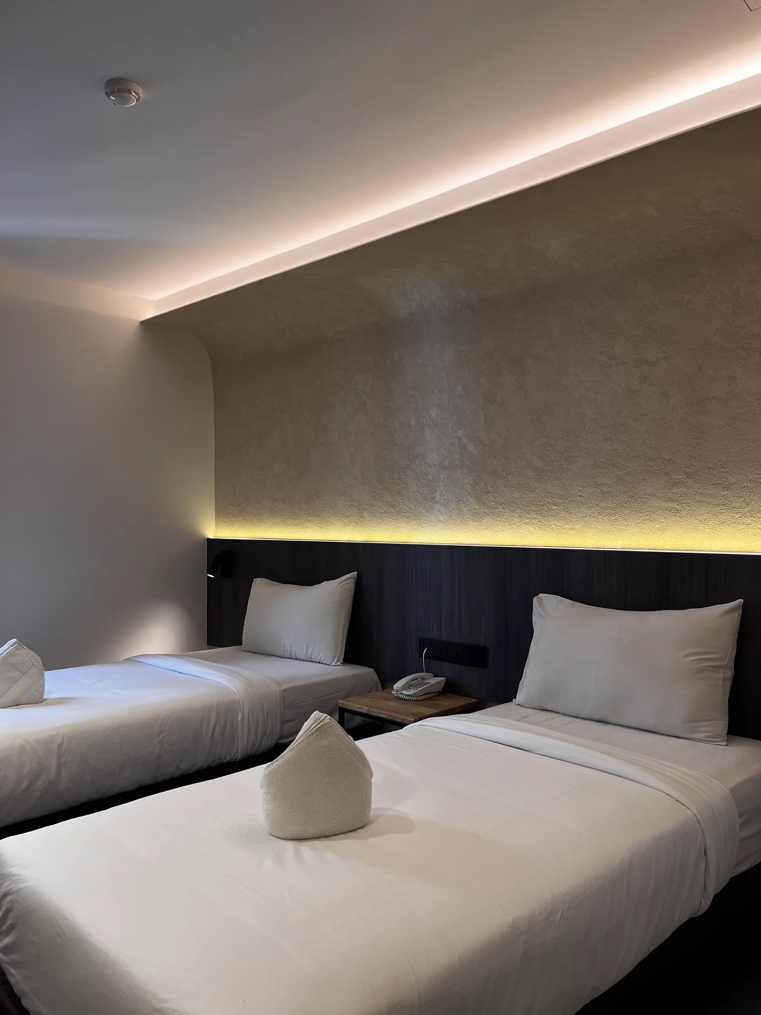 MyHotel twin guest beds and warm concealed lighting